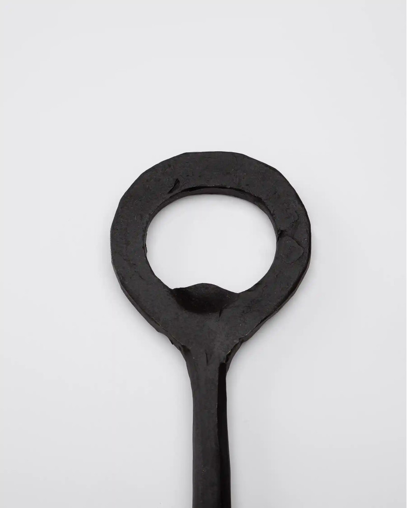 TUTUPI bottle opener in stainless steel 15 x 0,5 x 4 cm in black colour