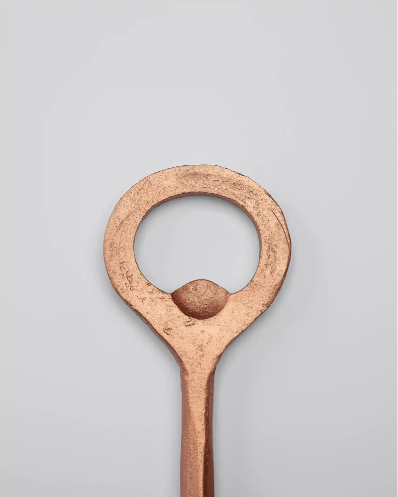 TUTUPI bottle opener in stainless steel 15 x 0,5 x 4 cm in copper colour